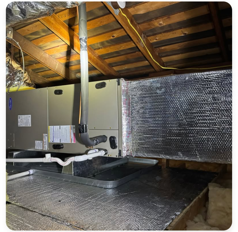 Attic ductwork and radiant barrier installed by American Attics